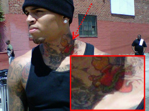 Chris recently got a new tattoo and it seems to be a heart with a sword 